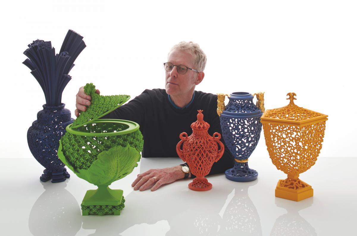 Michael Eden with a selection of works created using 3D printing. Image Courtesy of Adrian Sassoon, London
