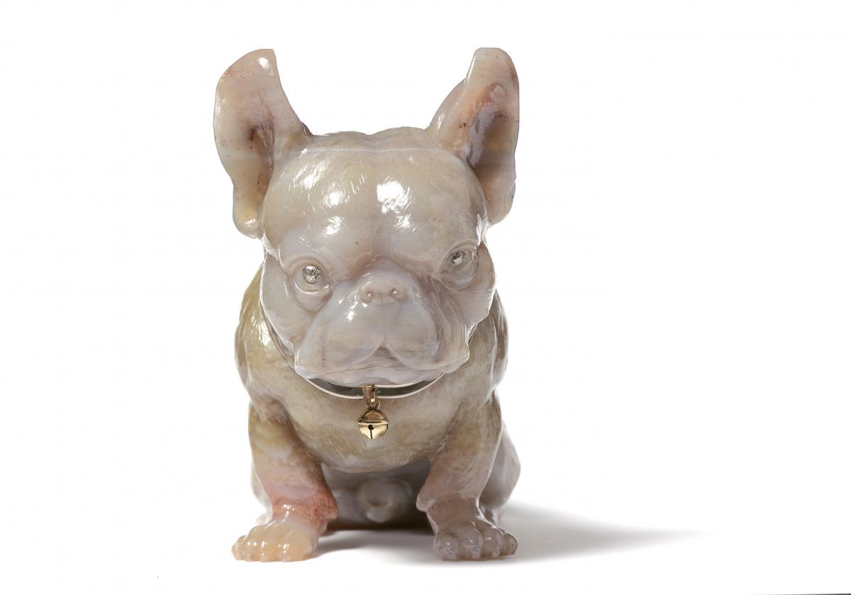 A French bulldog by Fabergé, carved from petrified wood, enamelled gold collar, diamond eyes, St. Petersburg, circa 1912. Private collection, images courtesy of Wartski, London