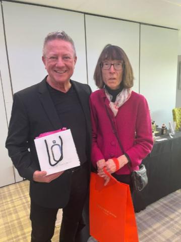 Our raffle winner picking up her prize