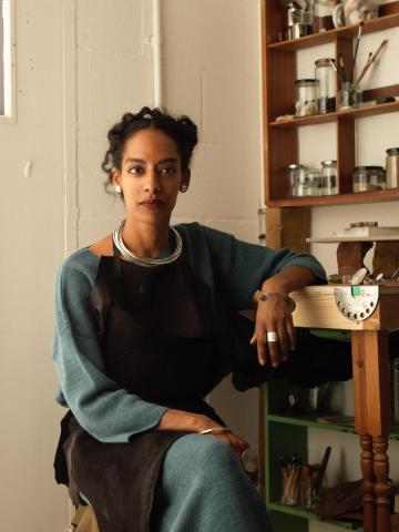 Jewellery designer and silversmith Meron Wolde combines dramatic texture and contours with elaborate form working in recycled silver and gold drawing inspiration from her background growing up in Sweden and her Eritrean roots.  www.MeronWolde.com