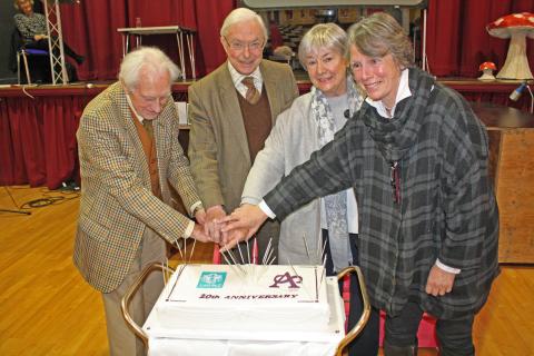 Founder members cutting the 20th Anniversary cake in December 2017
